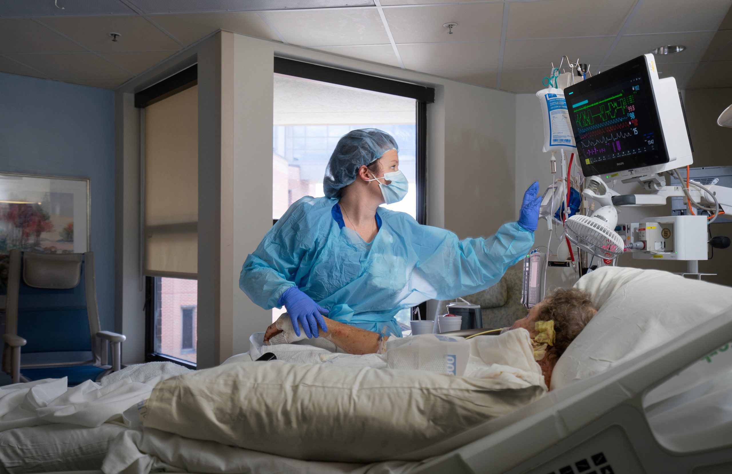 Burn unit teammate with patient