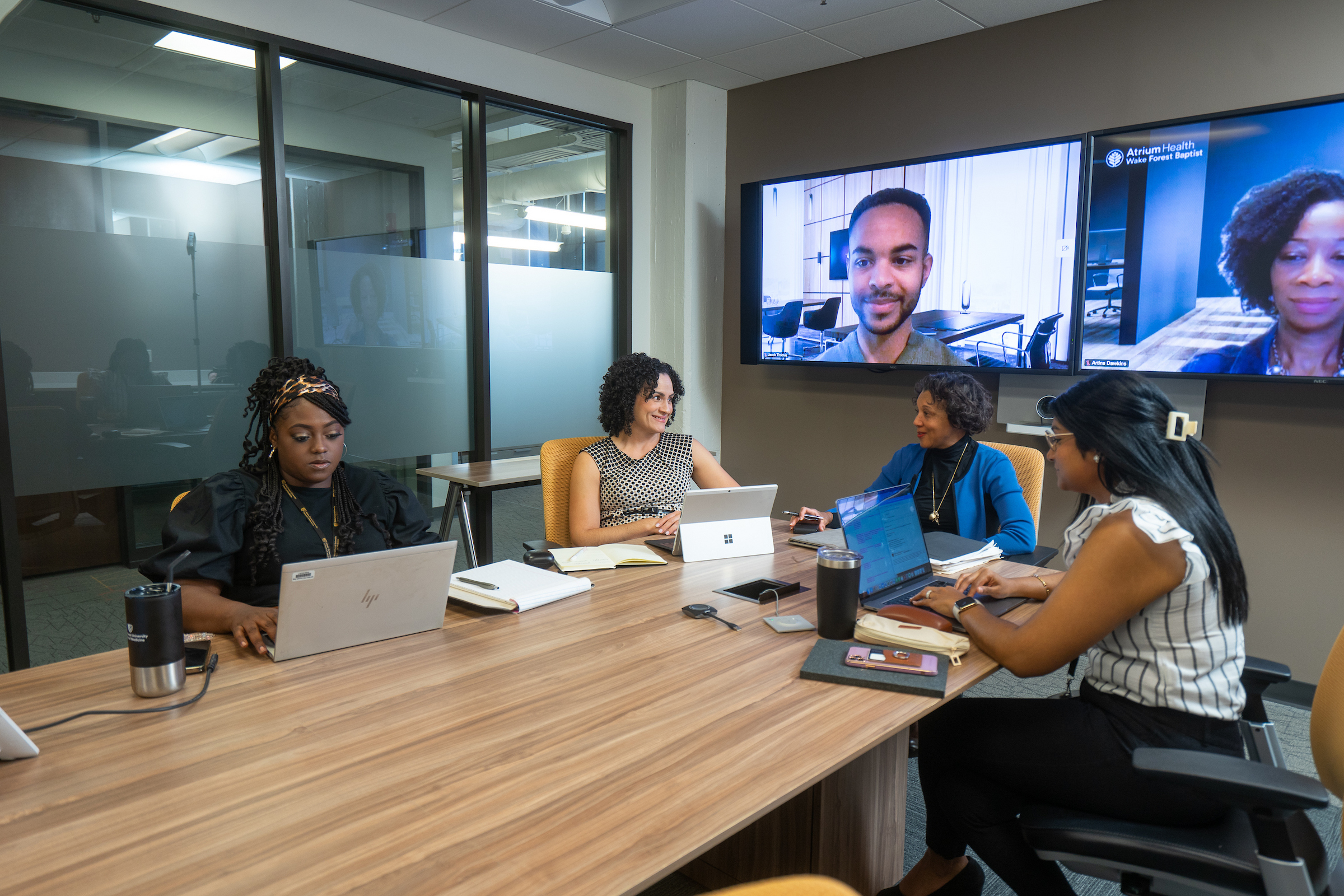 Members of the office of Justice, Equity, Diversity and Inclusion (JEDI) have a meeting.