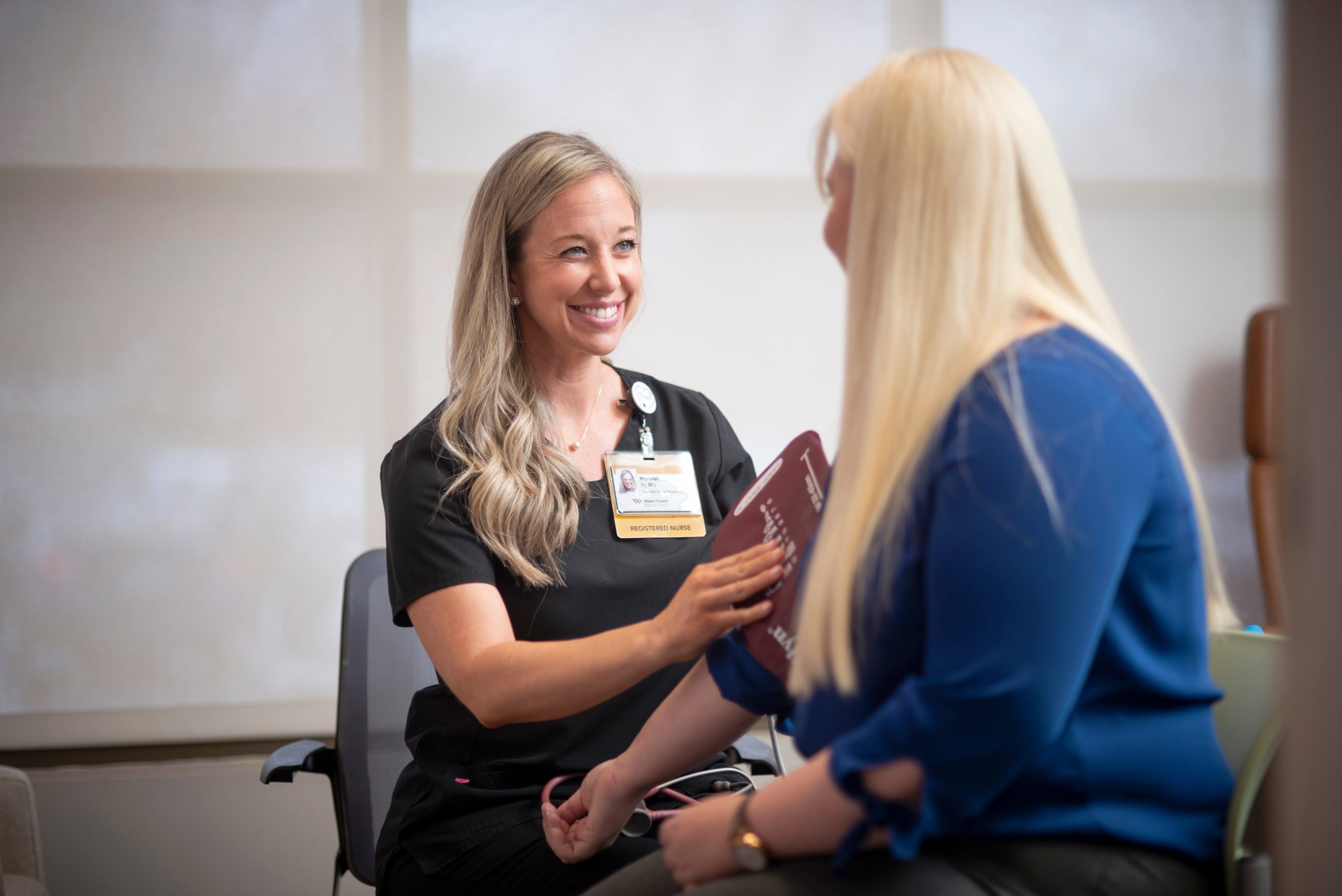Advocate Health RN taking vitals