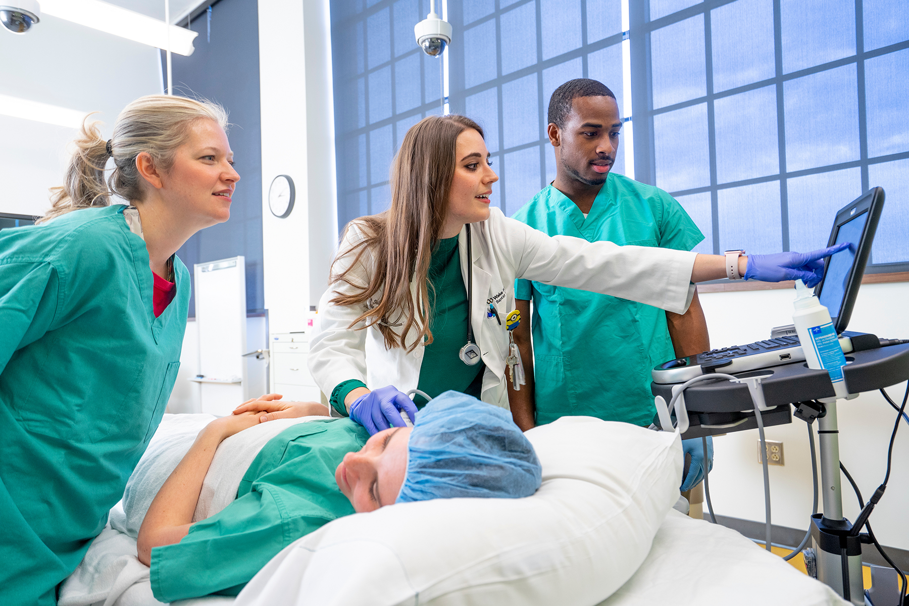 group of clinical staff learning in hospital setting